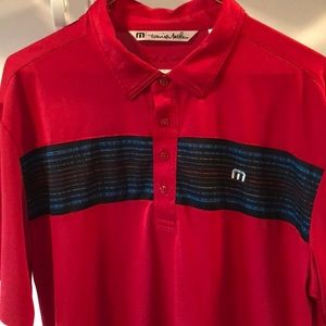 Travis Mathew golf shirt.